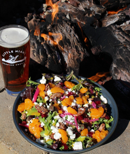 Image featuring winter beet salad with a glass of IPA from Little Miami Brewing Company.