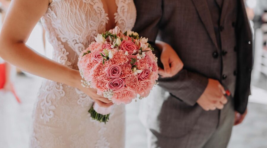 Bride and groom sharing a quiet moment with bouquet at Little Miami Event Centre in Cincinnati.